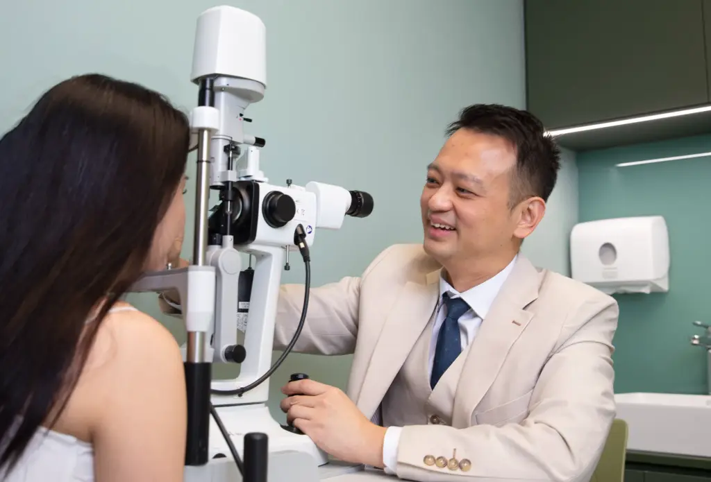 dr philemone huang examines patient